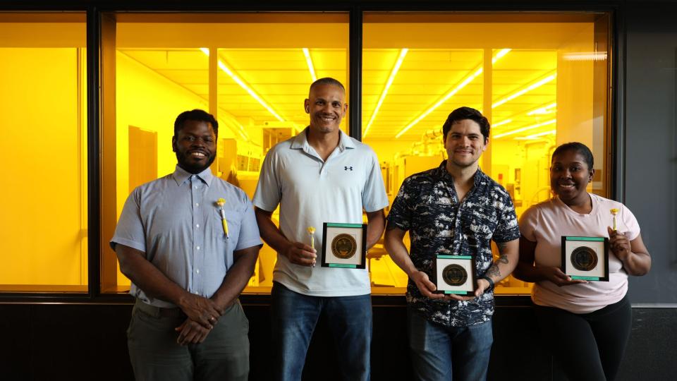 The four members of the 2025 MNCP with the wafers they made.