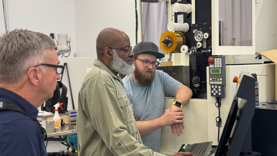<p>As part of the partnership, Southern Regional Technical College Instructor Marvin Bannister (center) received hands-on training on advanced machining equipment to prepare for teaching Georgia’s next generation of manufacturers. Photo: Audra Davidson.</p> As part of the partnership, Southern Regional Technical College Instructor Marvin Bannister (center) received hands-on training on advanced machining equipment to prepare for teaching Georgia’s next generation of manufacturers.