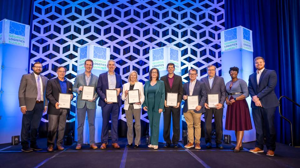 <p>Members of the Georgia Center of Innovation – Logistics Advisory Board gathered at the 2025 Georgia Logistics Summit, where each received a personal note of recognition from Governor Brian Kemp for three years of dedicated service. Their collective efforts have advanced freight and logistics across Georgia—strengthening collaboration between industry, government, and academia to drive the state’s economic growth.</p> Members of the Georgia Center of Innovation – Logistics Advisory Board gathered at the 2025 Georgia Logistics Summit, where each received a personal note of recognition from Governor Brian Kemp for three years of dedicated service. Their collective efforts have advanced freight and logistics across Georgia—strengthening collaboration between industry, government, and academia to drive the state’s economic growth.